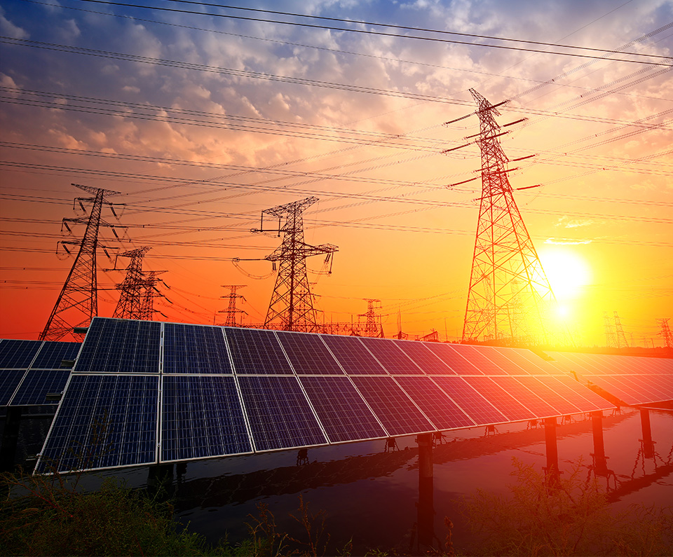 power_grid Solar panels and power grid, showing cable towers